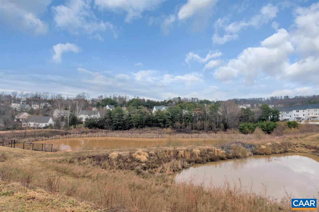 474 Rolkin Road Charlottesville, VA 22911 - Photo 29 of 42 a view of a lake with mountains in the background