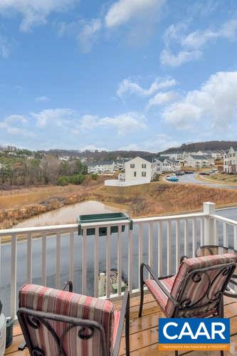 474 Rolkin Road Charlottesville, VA 22911 - Photo 30 of 42 a view of a balcony with chair and wooden floor