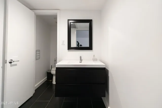 a view of backyard with sitting area