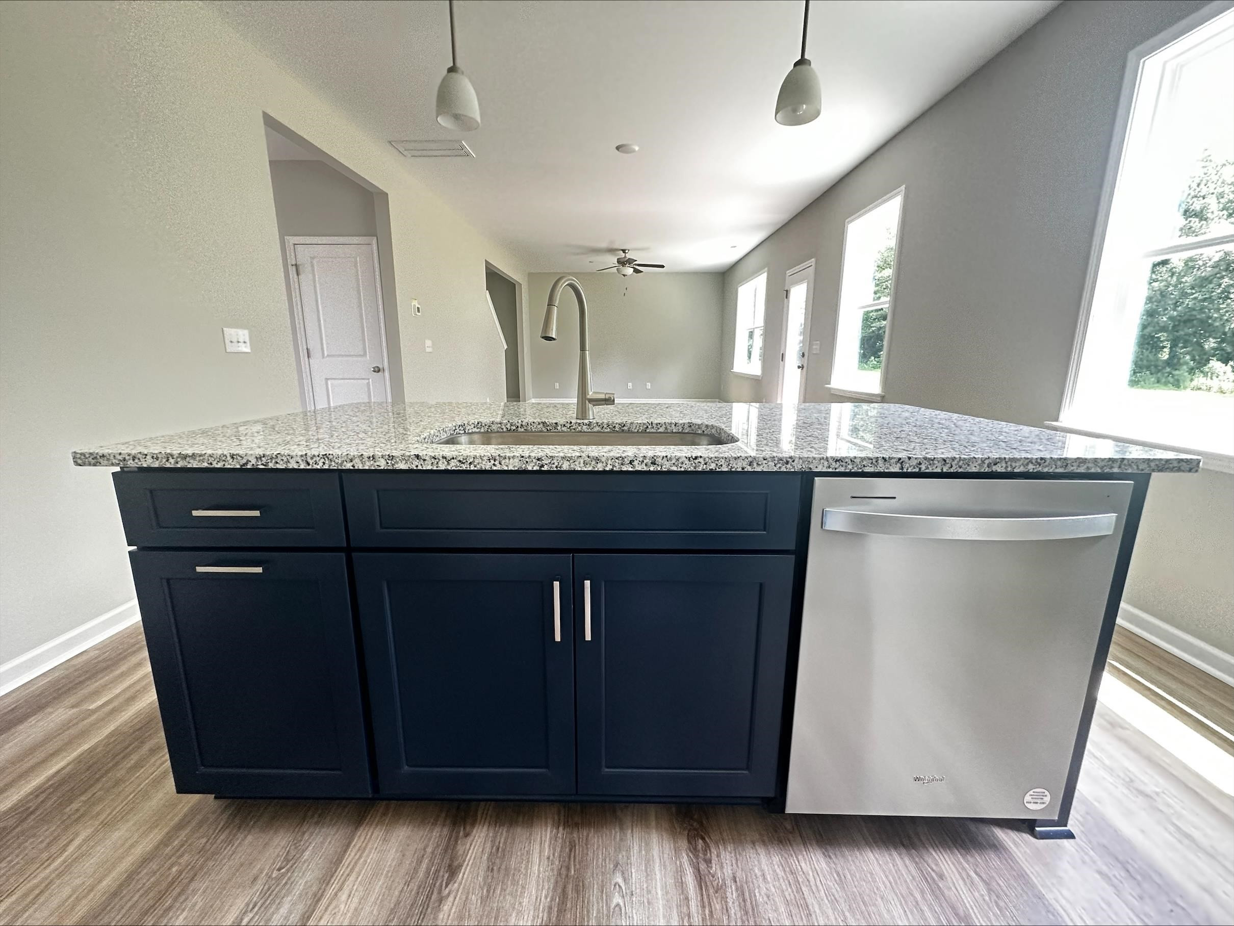 40 Daffodil Garden Smithfield, NC 27577 - Photo 5 of 17 a bathroom with a granite countertop sink and a mirror