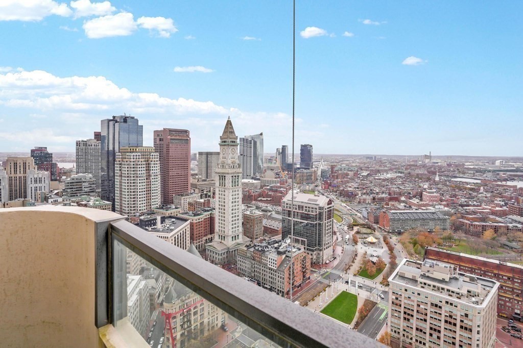 65 East India Row, Unit PHB Boston, MA 02110 - Photo 1 of 24 a view of a city from a terrace