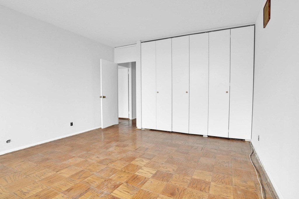 65 East India Row, Unit PHB Boston, MA 02110 - Photo 13 of 24 a view of room with hardwood