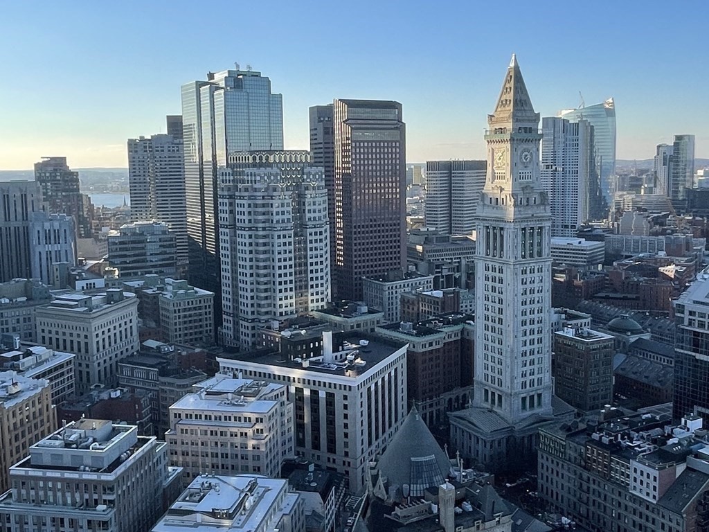 65 East India Row, Unit PHB Boston, MA 02110 - Photo 14 of 24 a city view with tall buildings