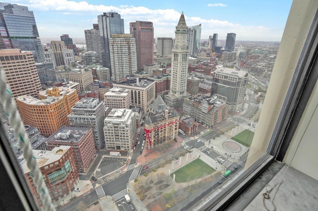 65 East India Row, Unit PHB Boston, MA 02110 - Photo 16 of 24 a view of city with tall buildings