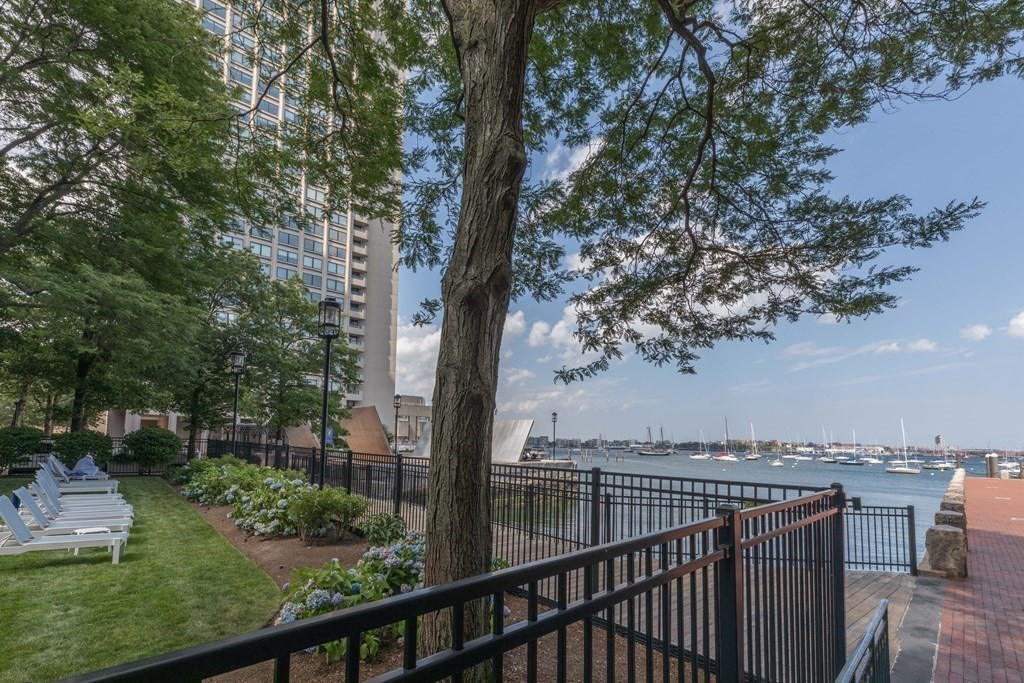 65 East India Row, Unit PHB Boston, MA 02110 - Photo 21 of 24 a view of a balcony with wooden fence