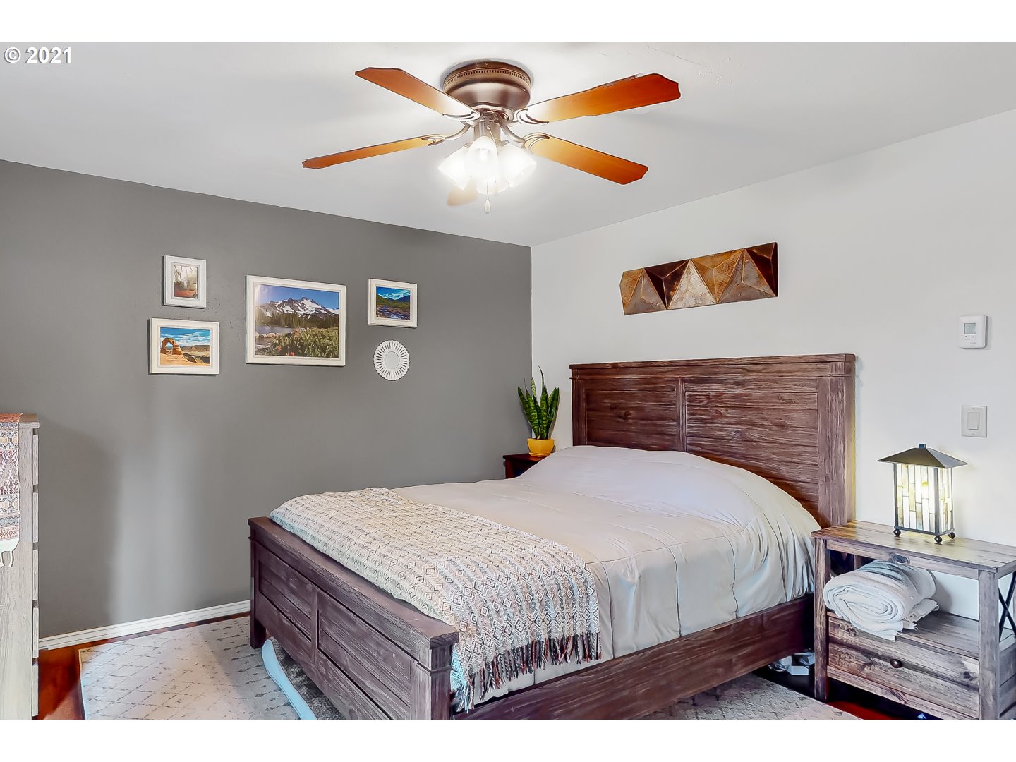 2486 York Street Eugene, OR 97404 - Photo 14 of 31 a bedroom with a bed and a painting on the wall