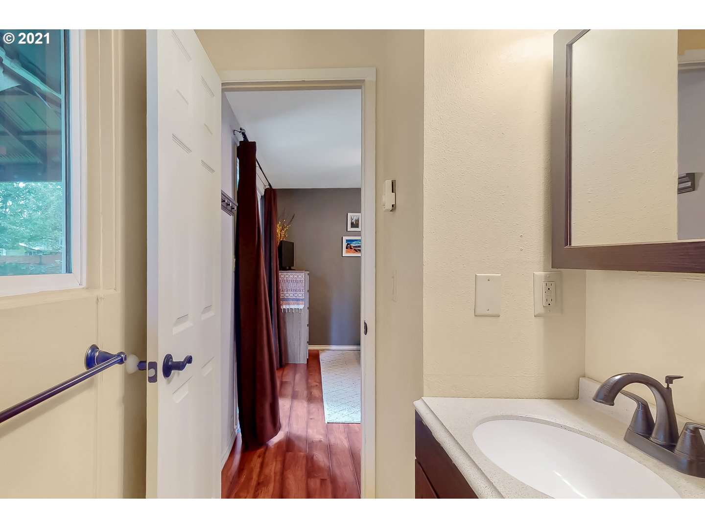 2486 York Street Eugene, OR 97404 - Photo 17 of 31 a bathroom with a sink and mirror