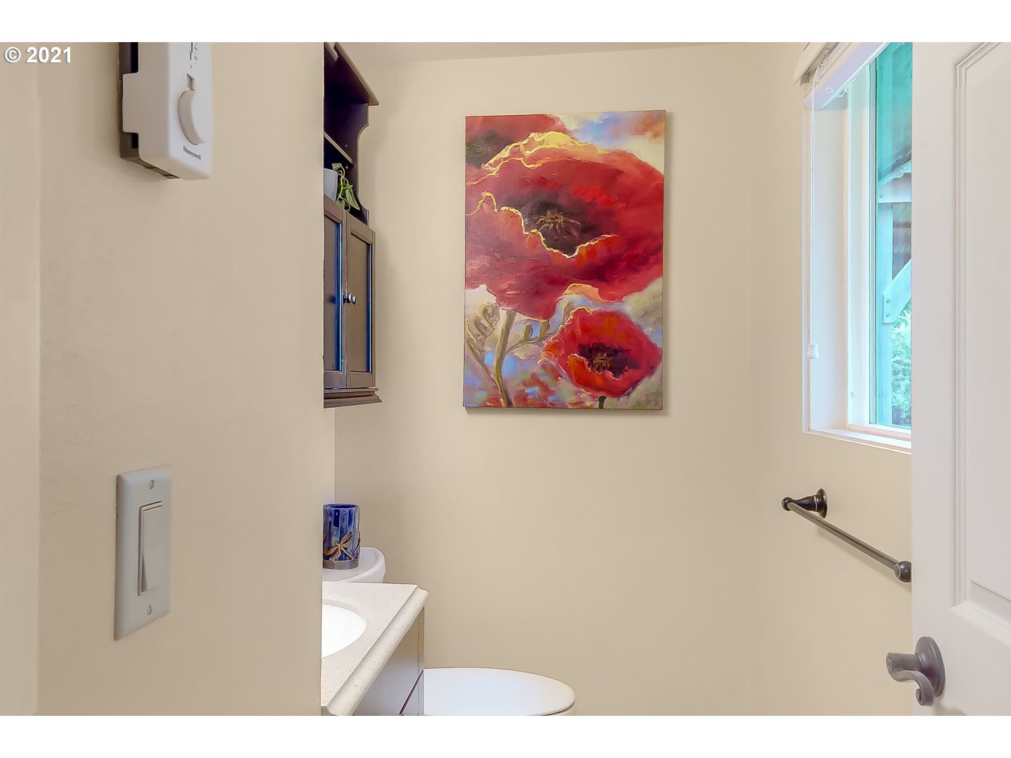 2486 York Street Eugene, OR 97404 - Photo 18 of 31 a picture of a bathroom with sink and a mirror
