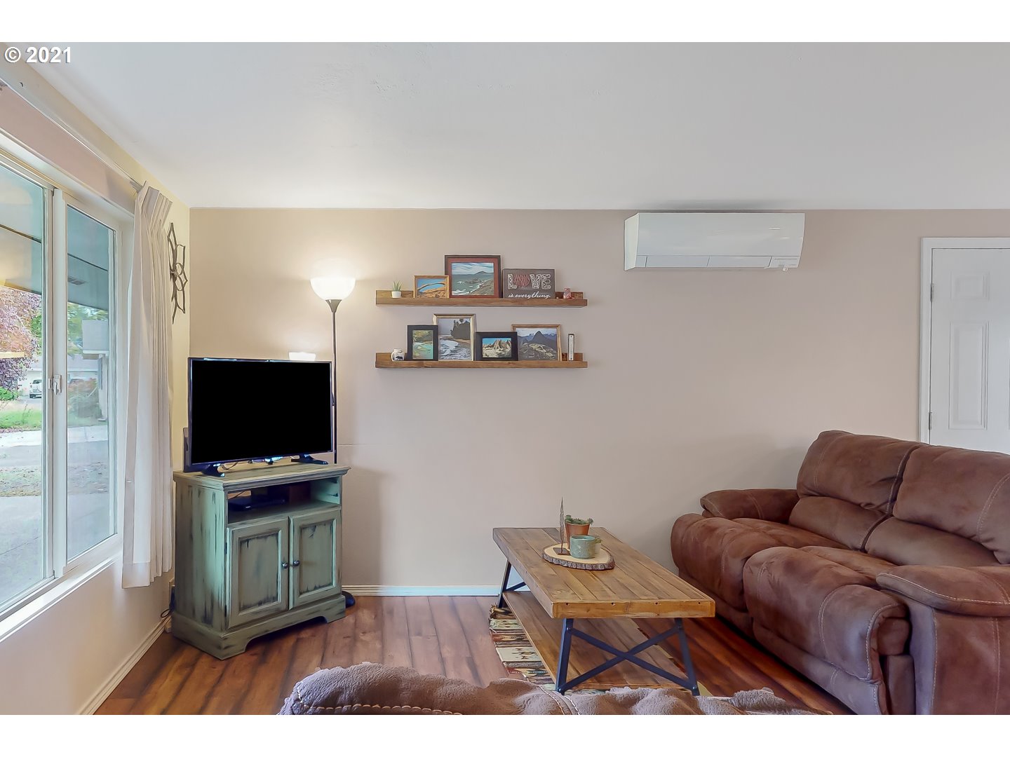 2486 York Street Eugene, OR 97404 - Photo 4 of 31 a living room with furniture and a flat screen tv