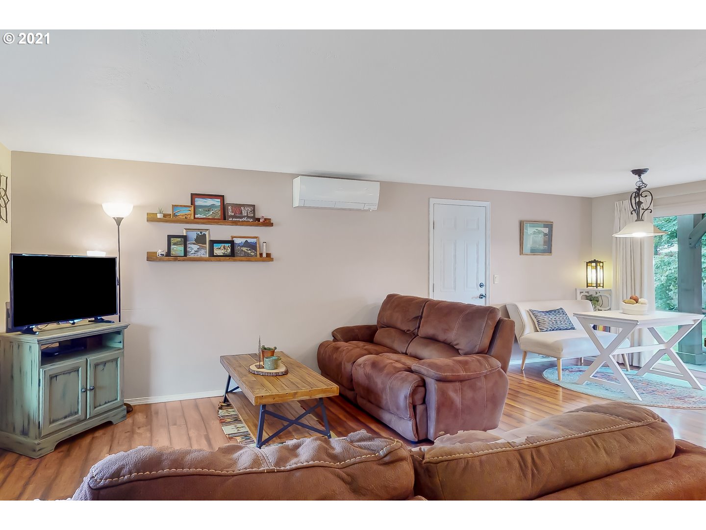 2486 York Street Eugene, OR 97404 - Photo 5 of 31 a living room with furniture and a flat screen tv