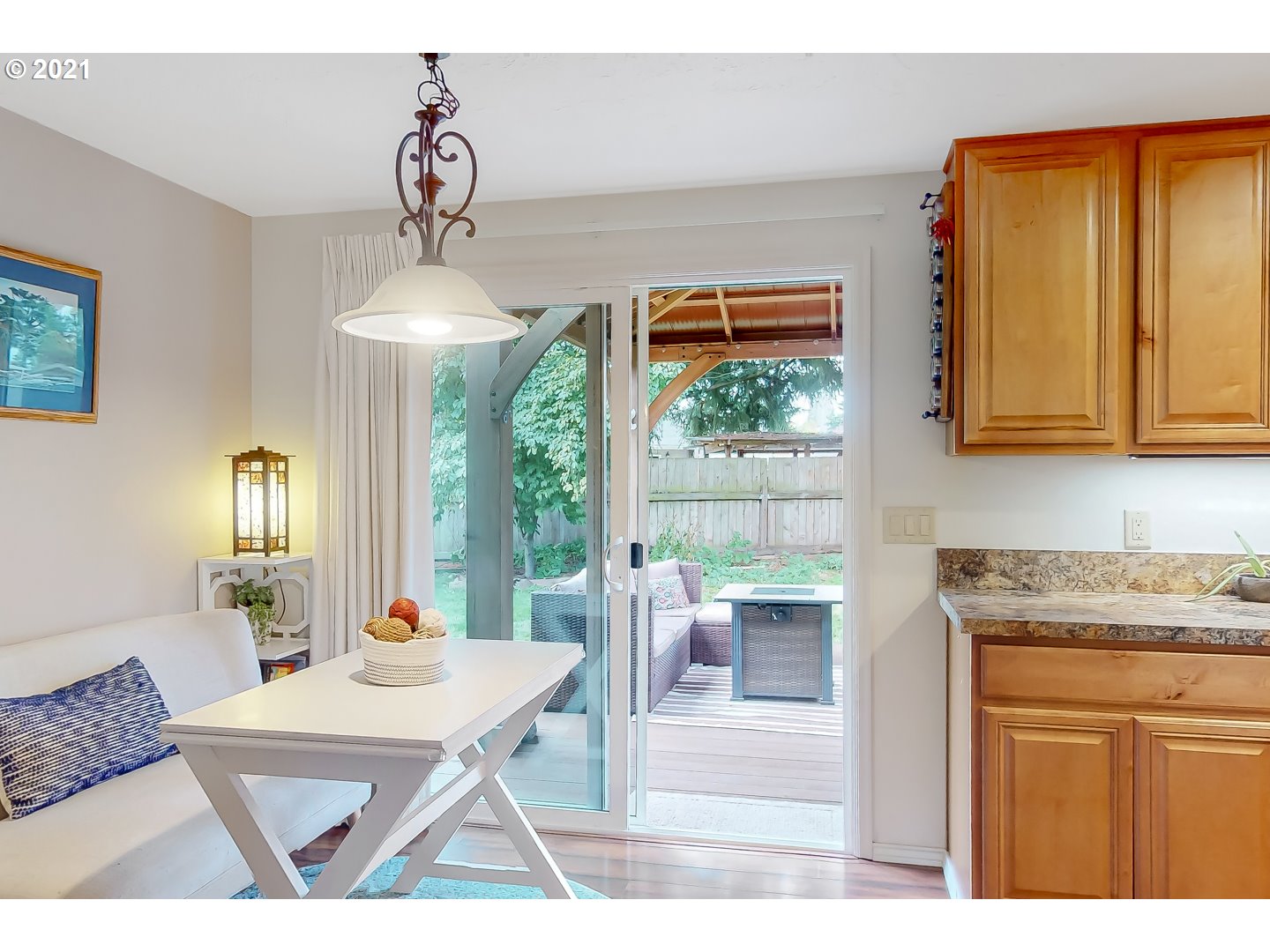 2486 York Street Eugene, OR 97404 - Photo 8 of 31 a living room with kitchen island furniture and a window