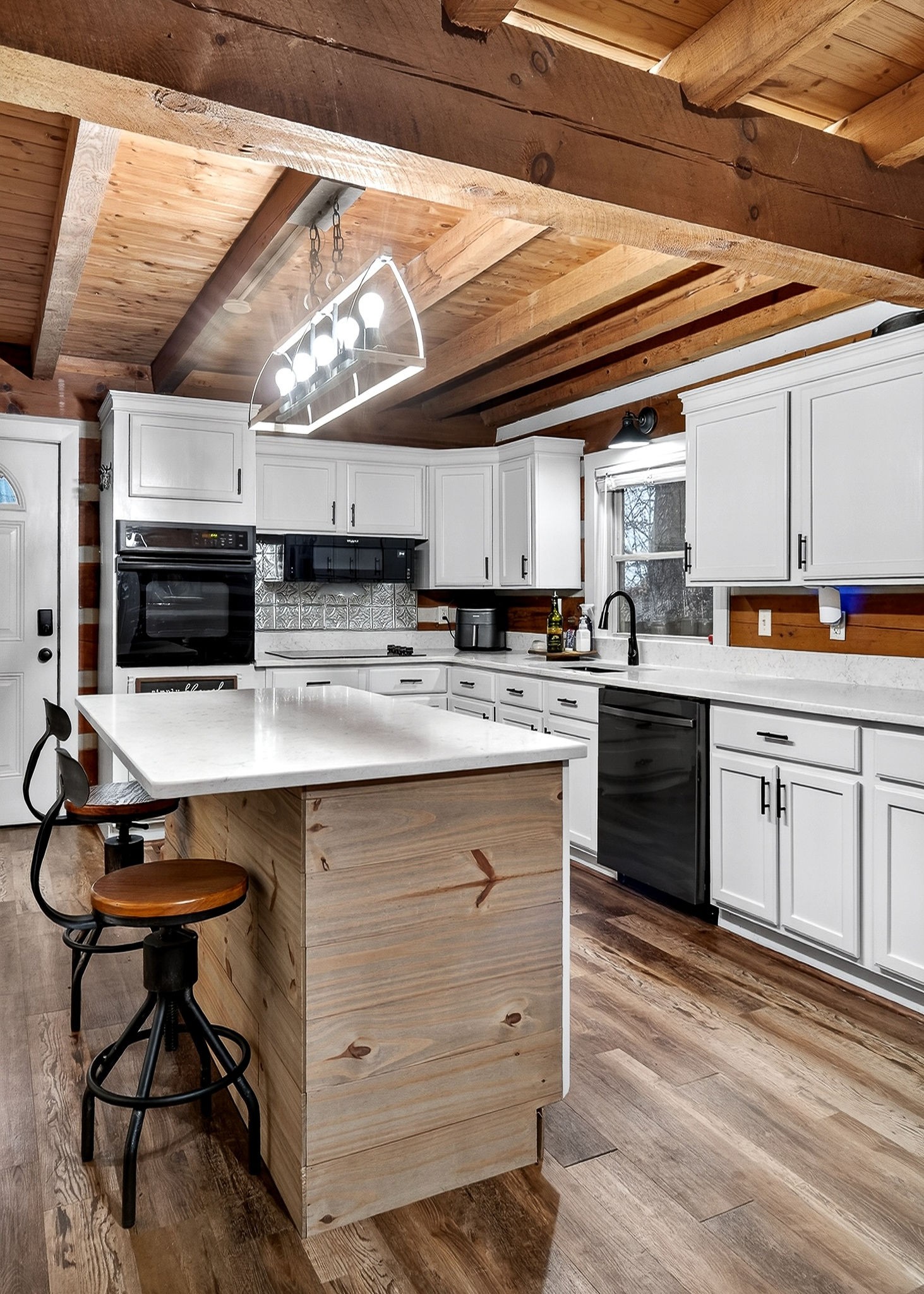 1399 Bethany Road McMinnville, TN 37110 - Photo 16 of 36 a kitchen with stainless steel appliances granite countertop a sink a stove and cabinets