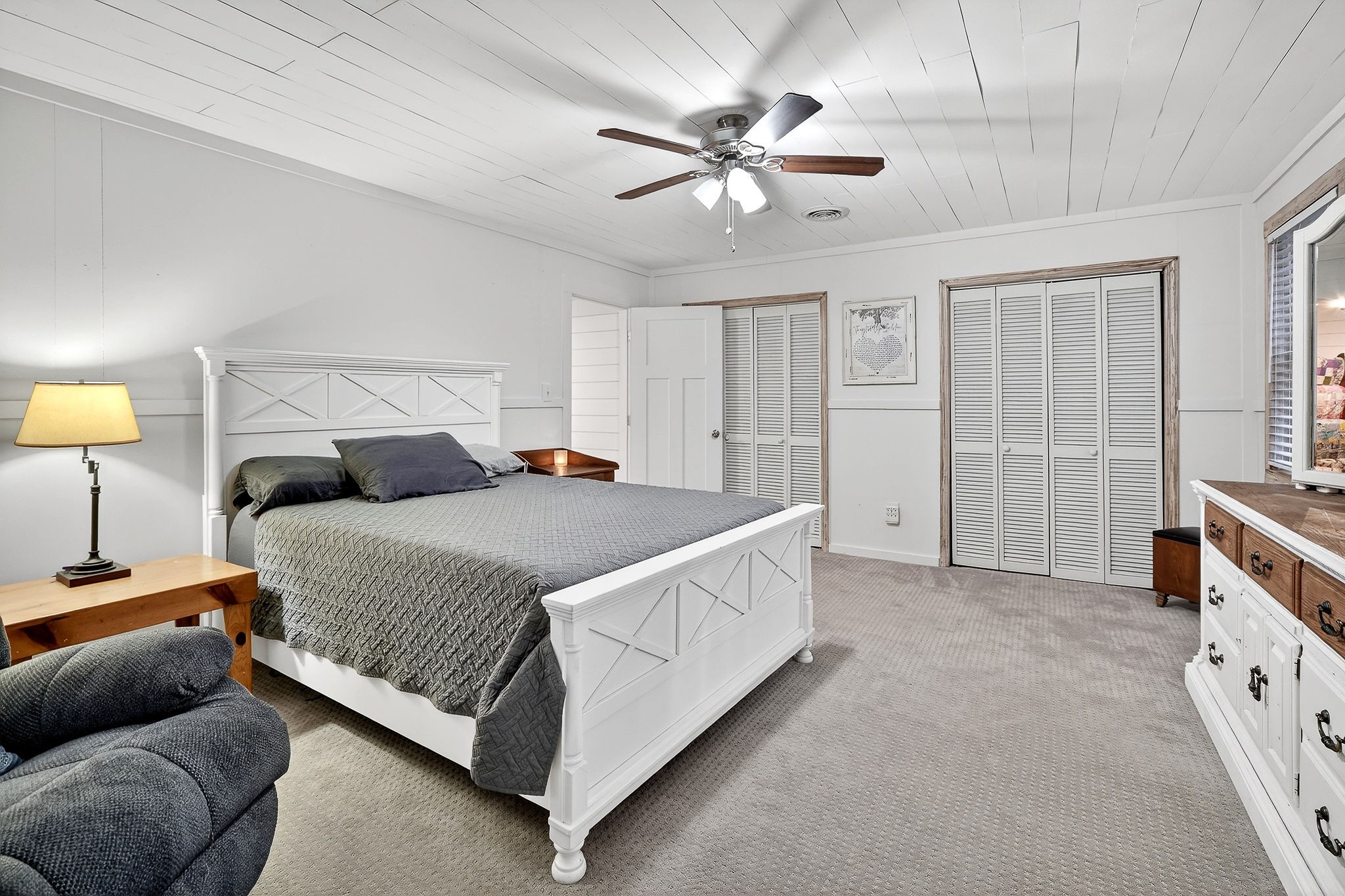 1399 Bethany Road McMinnville, TN 37110 - Photo 19 of 36 a bedroom with a bed chandelier and a window