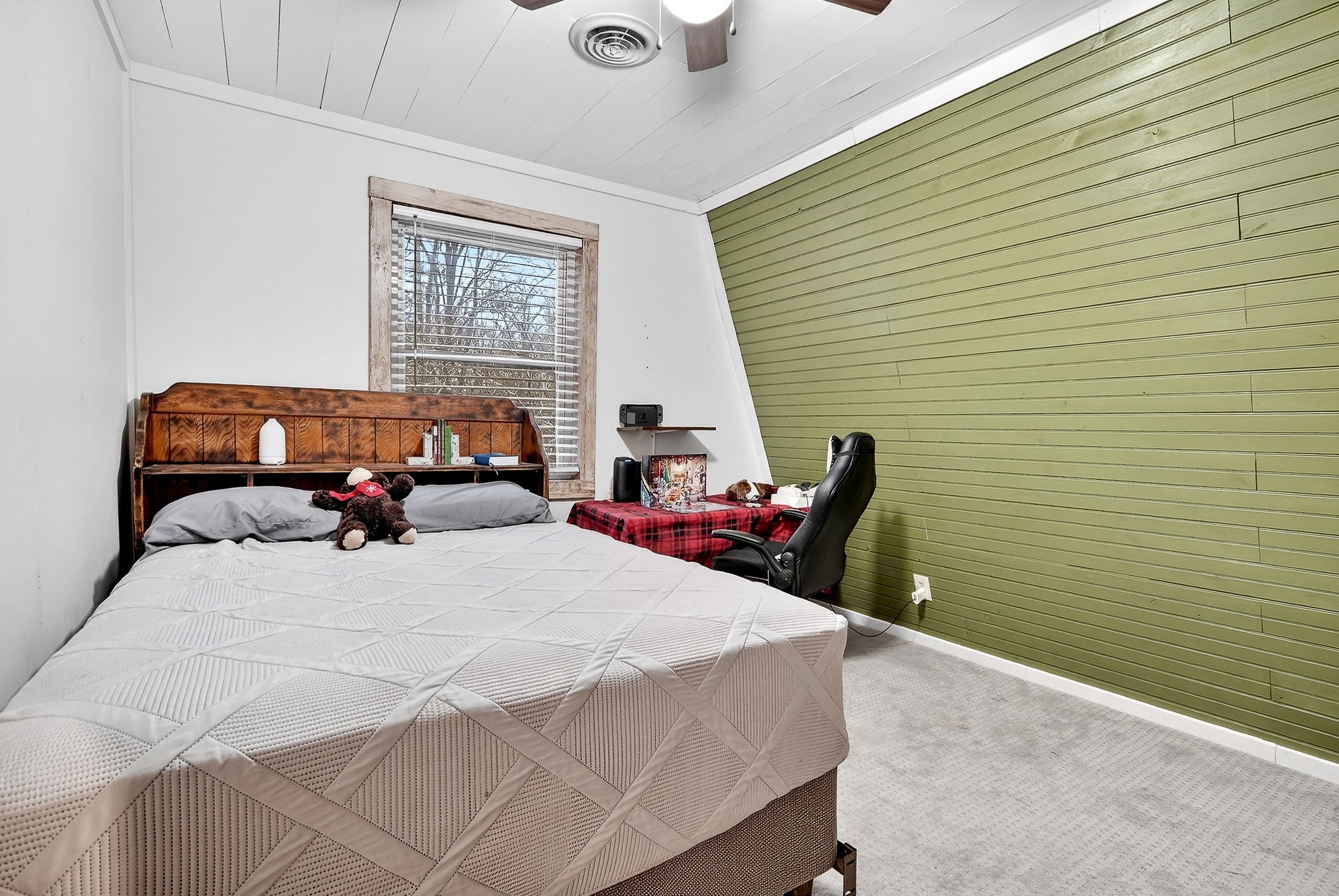 1399 Bethany Road McMinnville, TN 37110 - Photo 21 of 36 a bedroom with a bed and wooden floor