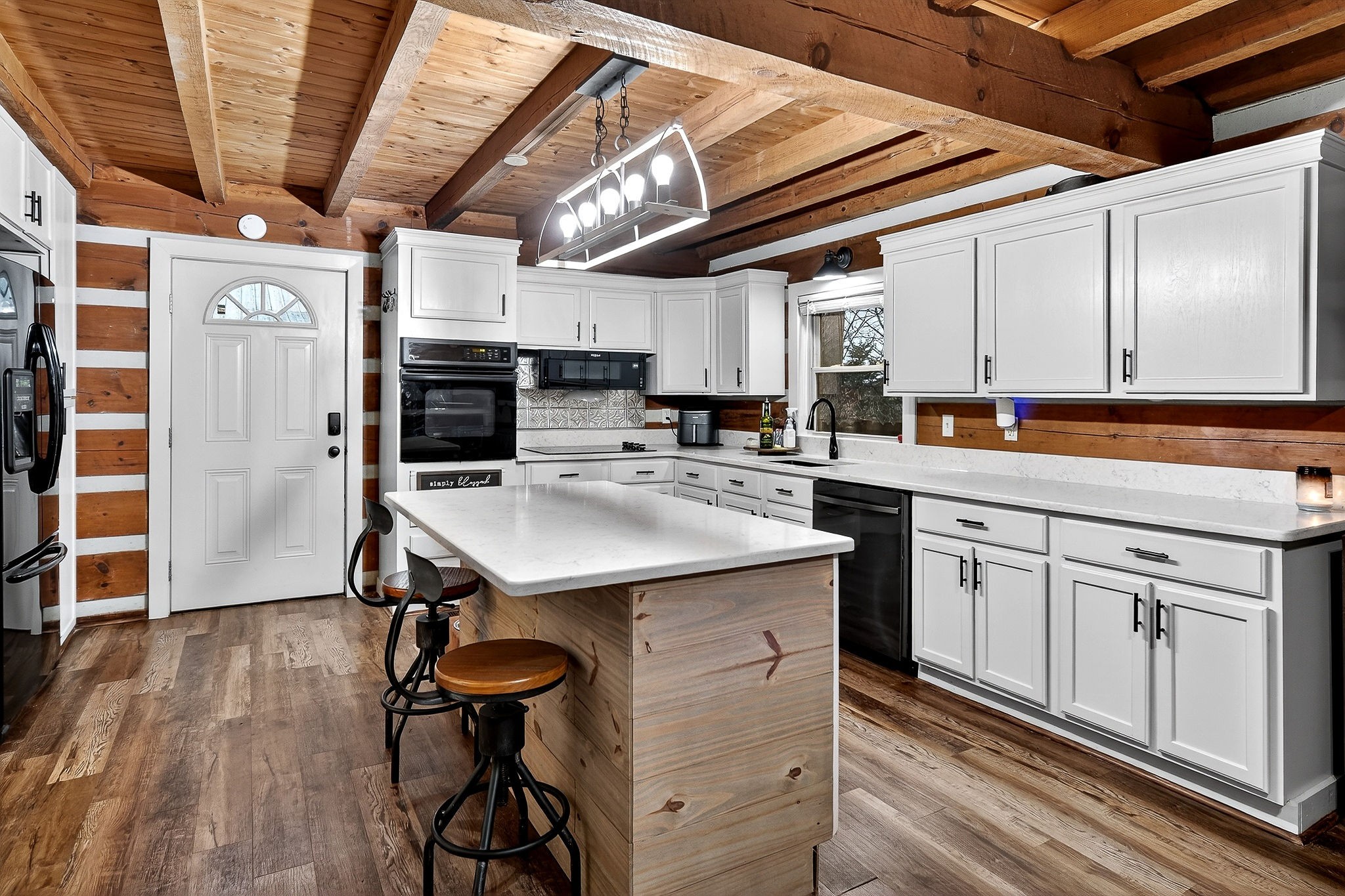 1399 Bethany Road McMinnville, TN 37110 - Photo 8 of 36 a kitchen with stainless steel appliances a sink a counter top space cabinets and wooden floor