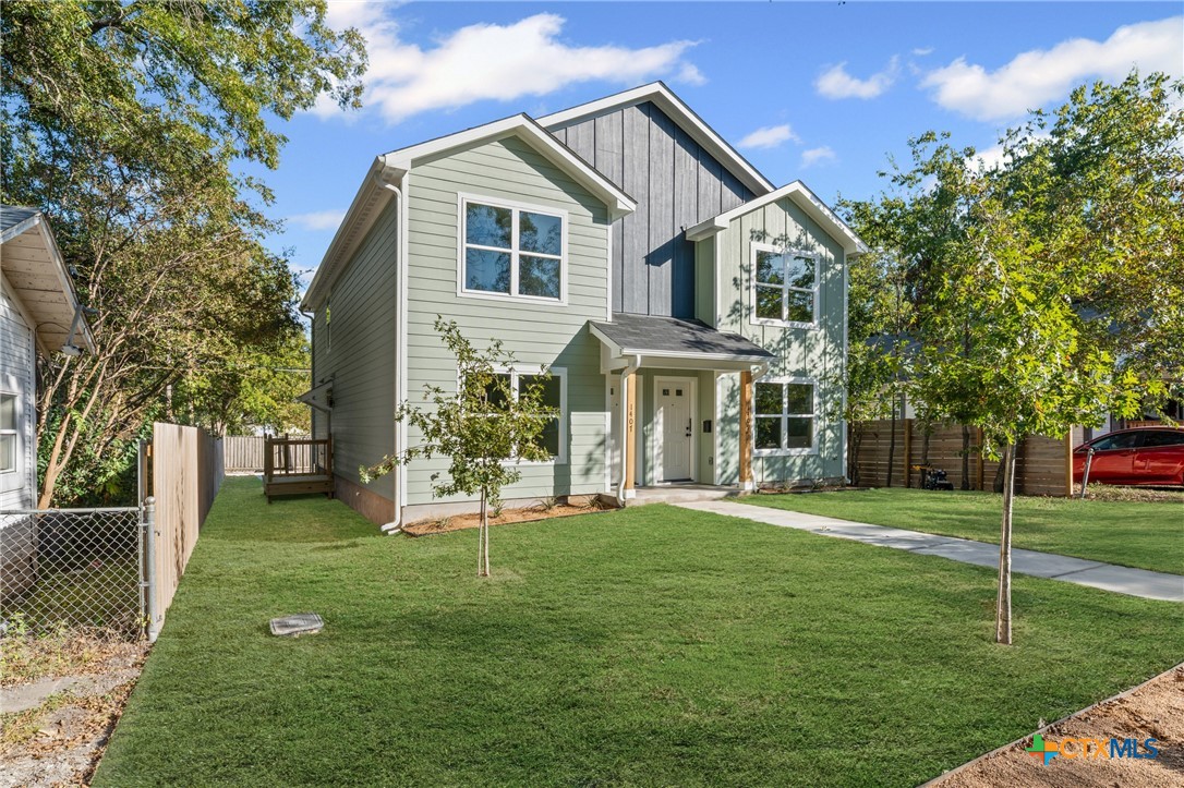 1407 South 5th Street Temple, TX 76504 - Photo 8 of 33 a view of a house with a yard and sitting area