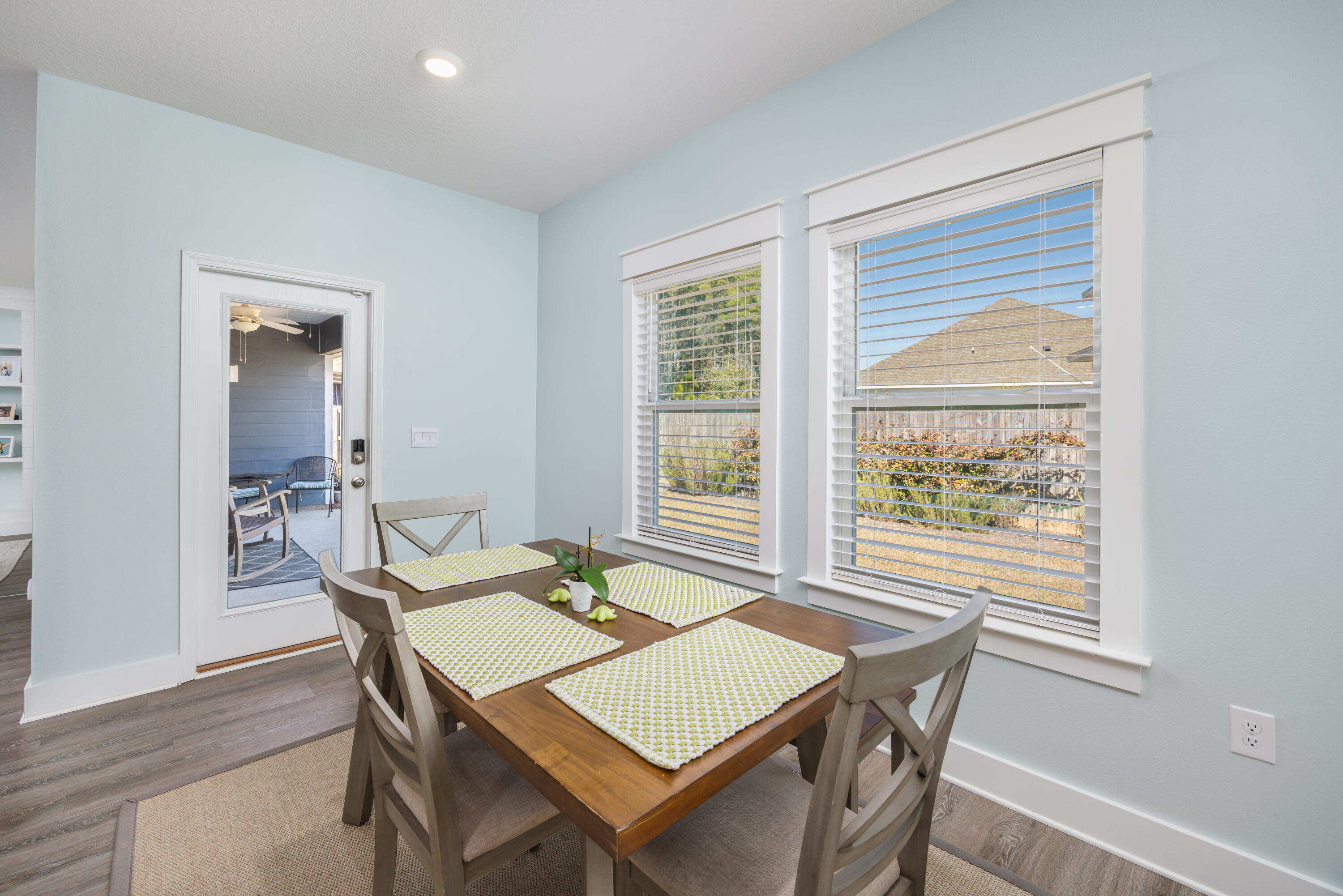193 Perimeter Place Freeport, FL 32439 - Photo 16 of 43 a view of a dining room with furniture window and wooden floor