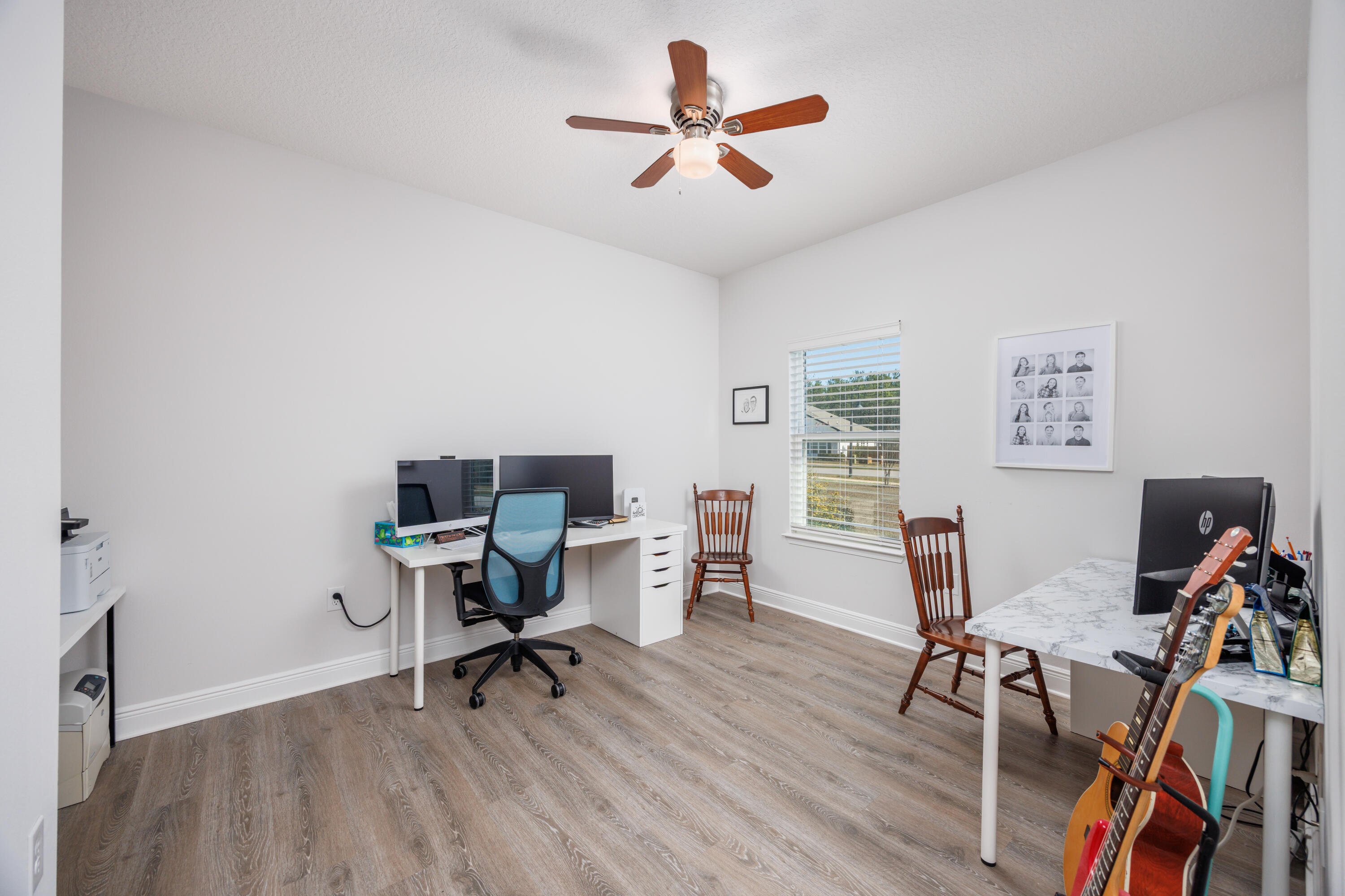 193 Perimeter Place Freeport, FL 32439 - Photo 20 of 43 a view of a workspace with furniture and a window