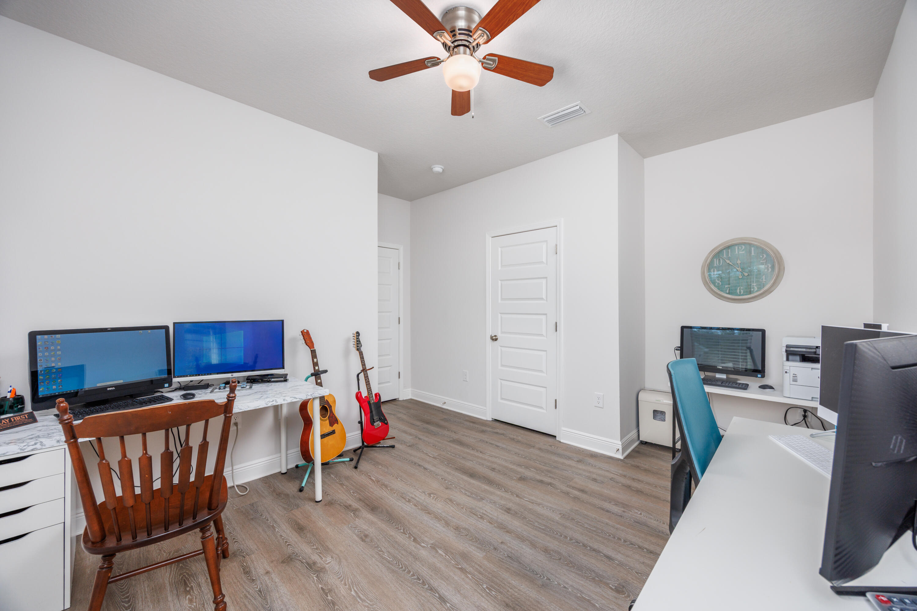 193 Perimeter Place Freeport, FL 32439 - Photo 21 of 43 a living room with furniture and a wooden floor