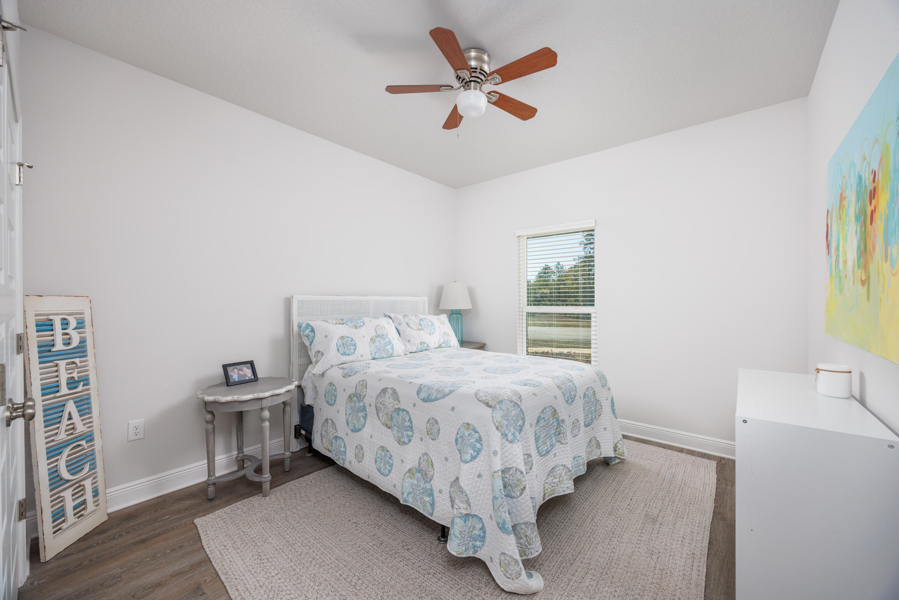193 Perimeter Place Freeport, FL 32439 - Photo 23 of 43 a bedroom with a bed and a window