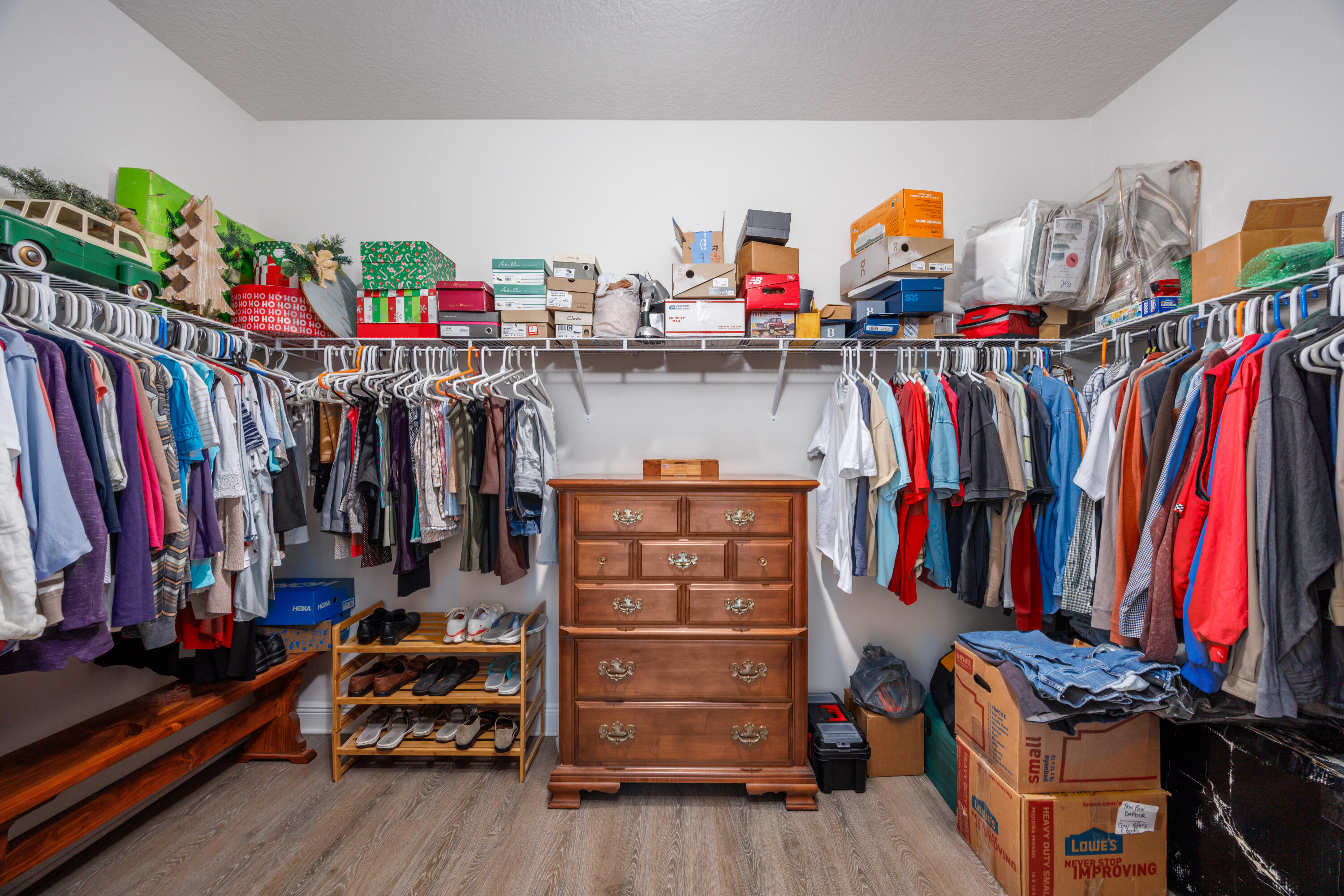 193 Perimeter Place Freeport, FL 32439 - Photo 29 of 43 a view of walk in closet with clothes and shoes