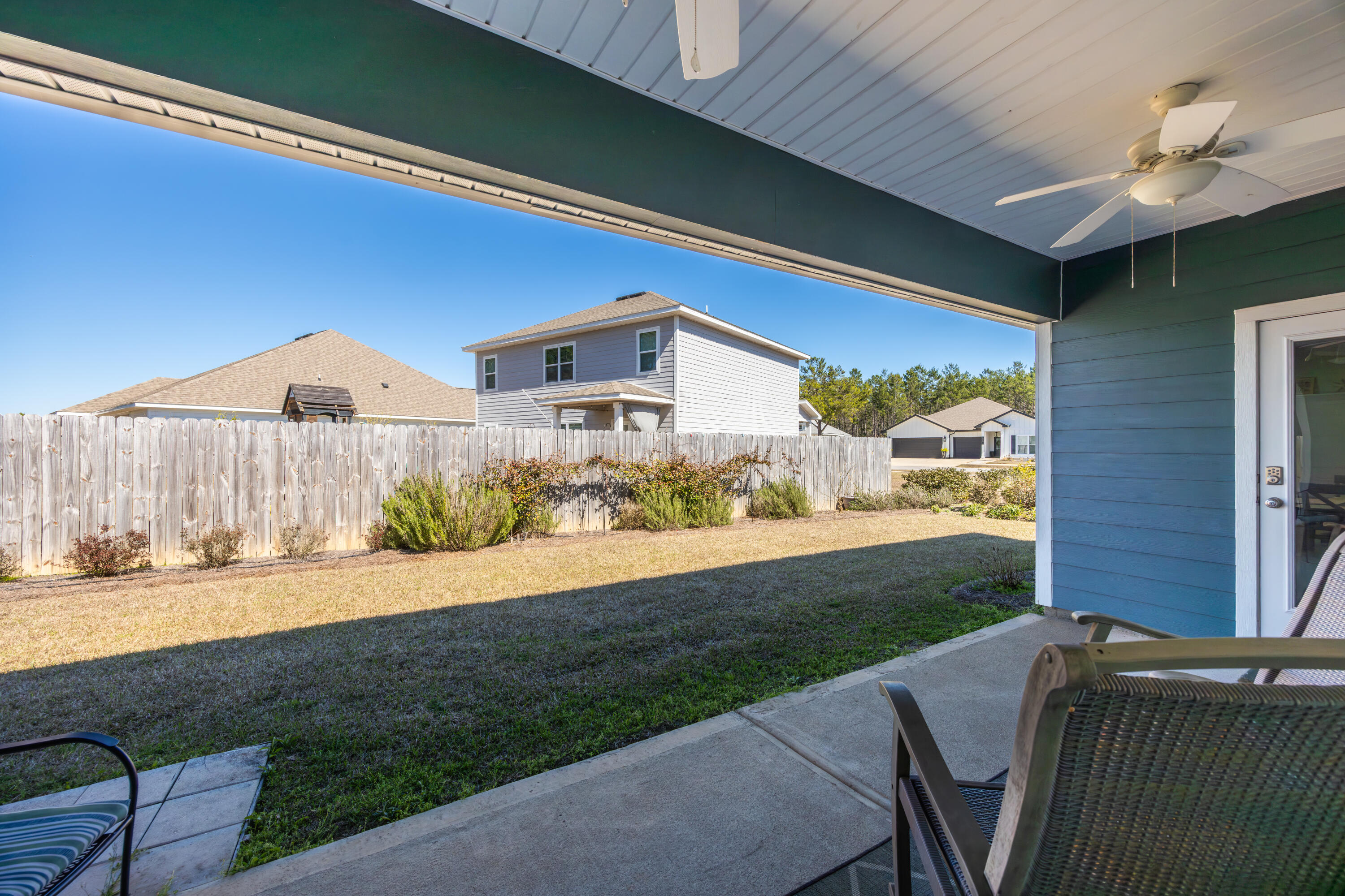 193 Perimeter Place Freeport, FL 32439 - Photo 32 of 43 a front view of a house with a yard