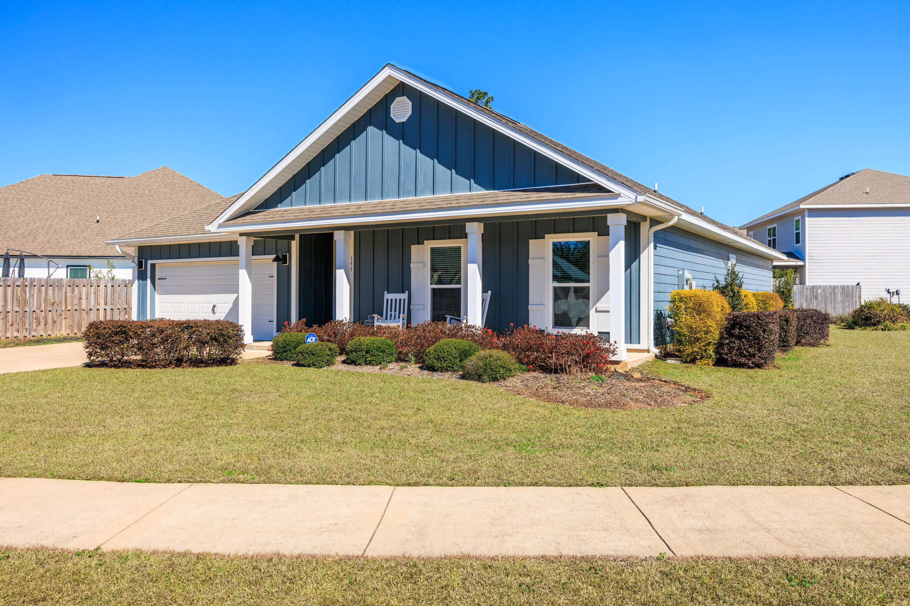 193 Perimeter Place Freeport, FL 32439 - Photo 38 of 43 a front view of a house with a yard
