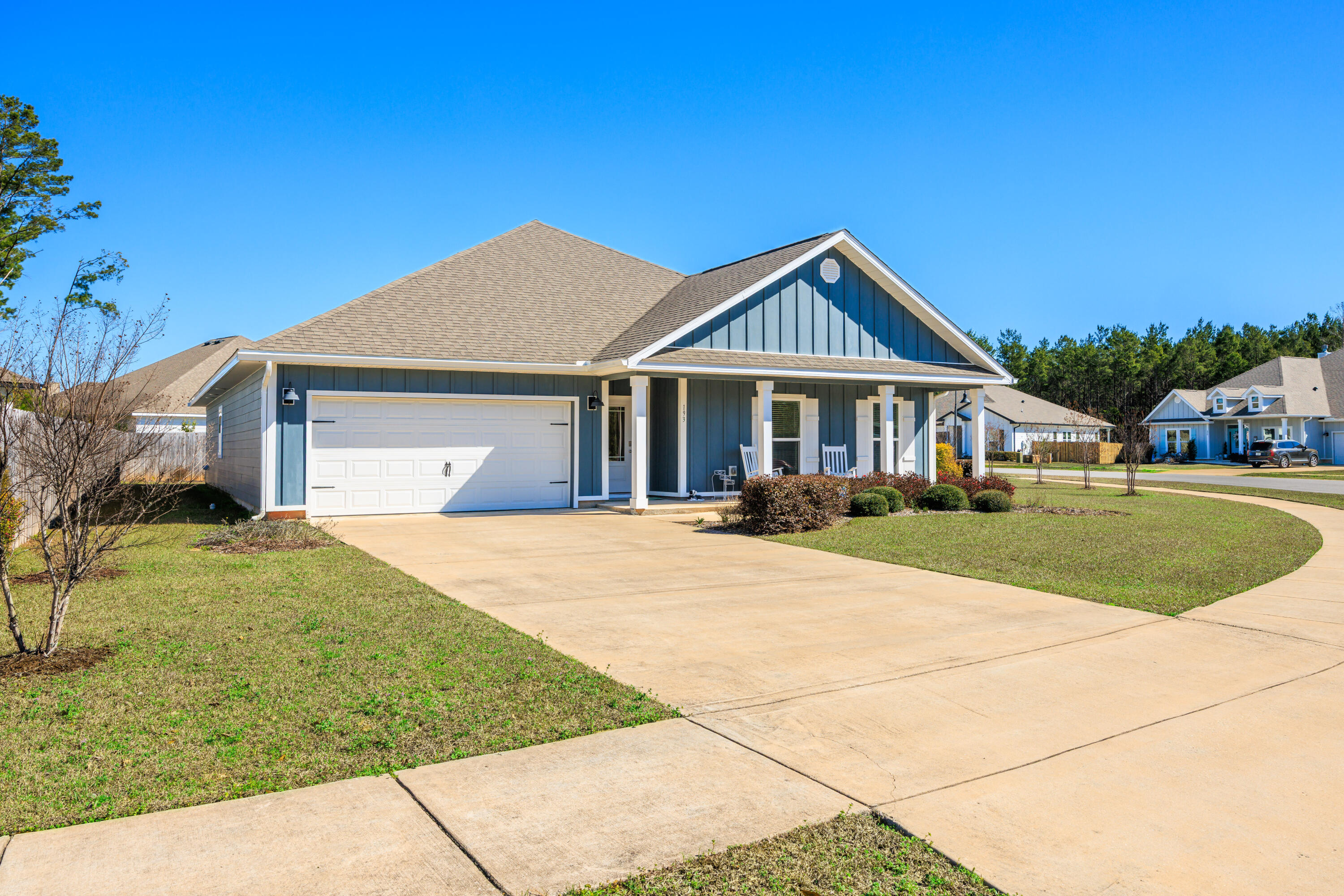 193 Perimeter Place Freeport, FL 32439 - Photo 40 of 43 a front view of a house with a yard