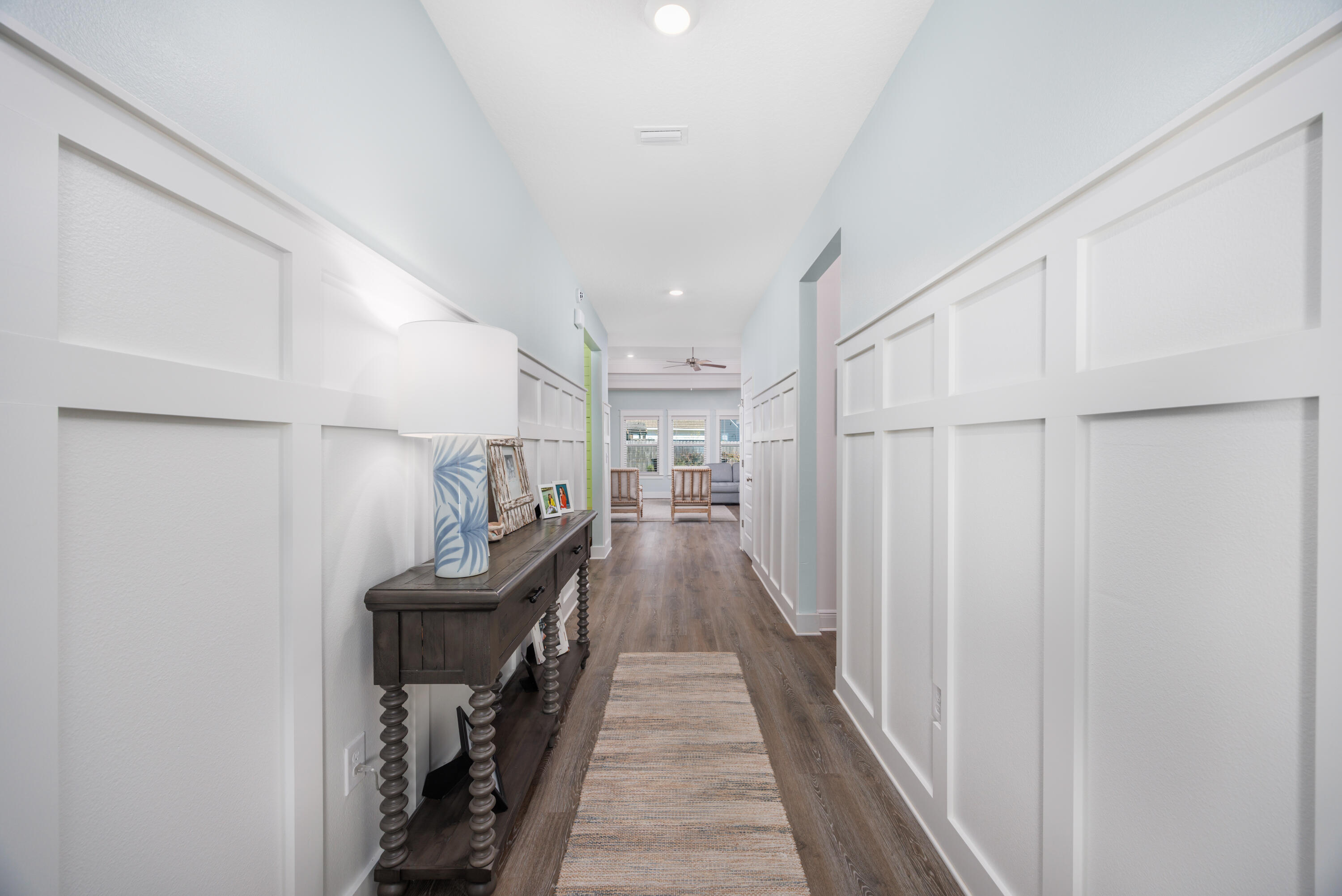 193 Perimeter Place Freeport, FL 32439 - Photo 4 of 43 a walk in closet with wooden floor and entryway