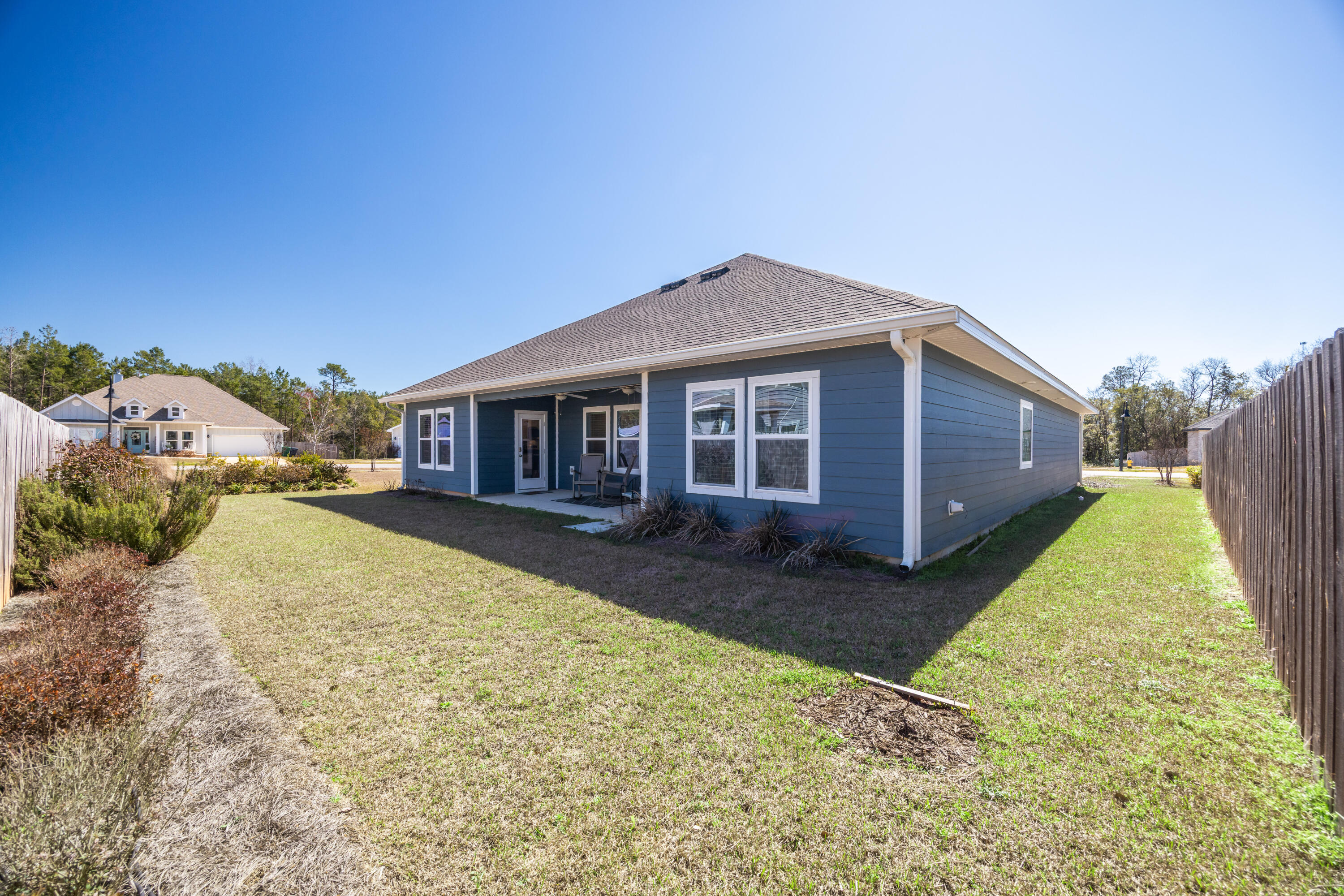 193 Perimeter Place Freeport, FL 32439 - Photo 43 of 43 a view of a house with backyard porch and sitting area