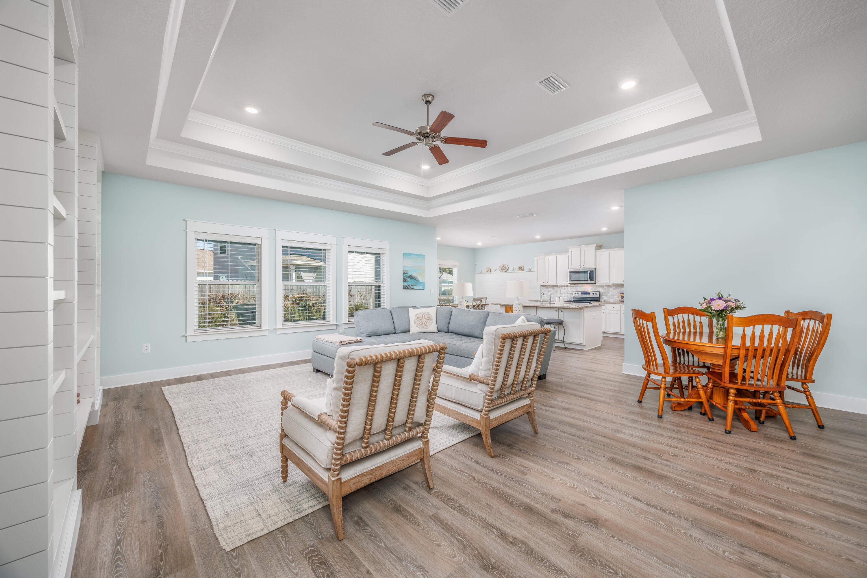 193 Perimeter Place Freeport, FL 32439 - Photo 7 of 43 a dining room with furniture a rug and wooden floor