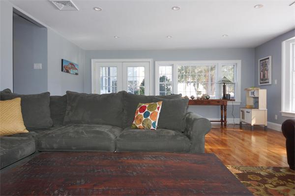 21 Elmwood Road Wellesley, MA 02481 - Photo 11 of 27 a living room with furniture and a large window