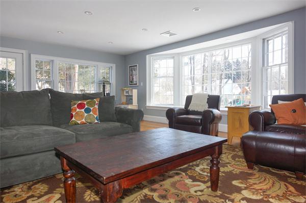 21 Elmwood Road Wellesley, MA 02481 - Photo 12 of 27 a living room with furniture and a large window