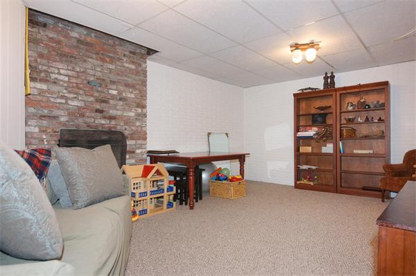 21 Elmwood Road Wellesley, MA 02481 - Photo 25 of 27 a view of a livingroom with furniture and closet