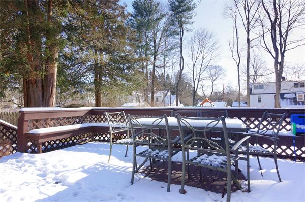 21 Elmwood Road Wellesley, MA 02481 - Photo 26 of 27 a view of a bench and table in the patio
