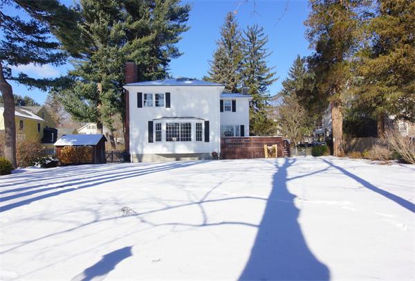 21 Elmwood Road Wellesley, MA 02481 - Photo 27 of 27 a view of a building with cars parked on the road