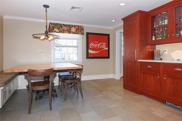 21 Elmwood Road Wellesley, MA 02481 - Photo 5 of 27 a dining room with a furniture and window
