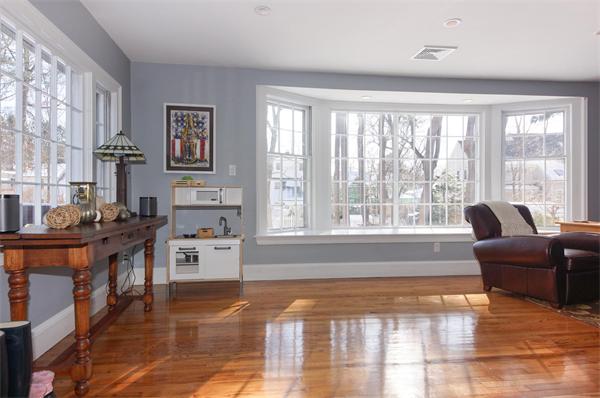 21 Elmwood Road Wellesley, MA 02481 - Photo 10 of 27 a living room with furniture and large windows