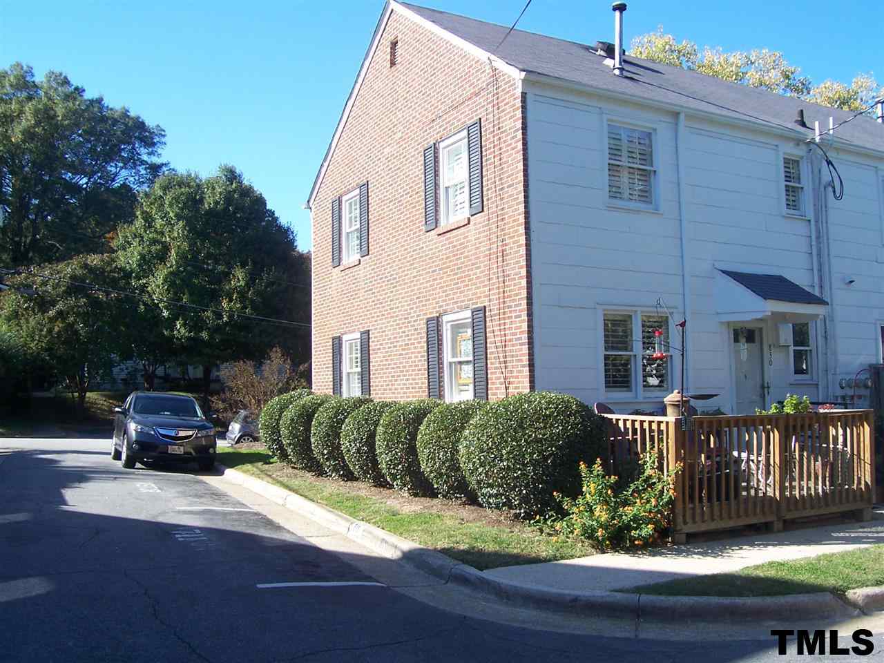 832 Bryan Street, Unit 2 Raleigh, NC 27605 - Photo 4 of 6 a view of multiple house with deck