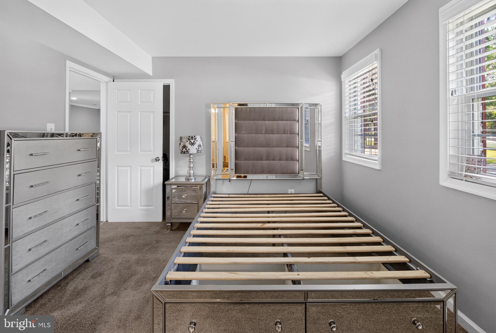 2816 Ridge Road Waldorf, MD 20603 - Photo 22 of 33 Modern elegance in a serene bedroom.