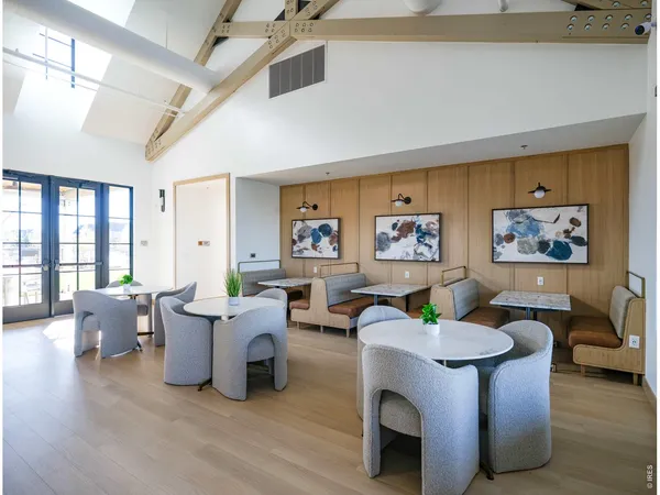 an aerial view of a house with a swimming pool outdoor seating and yard