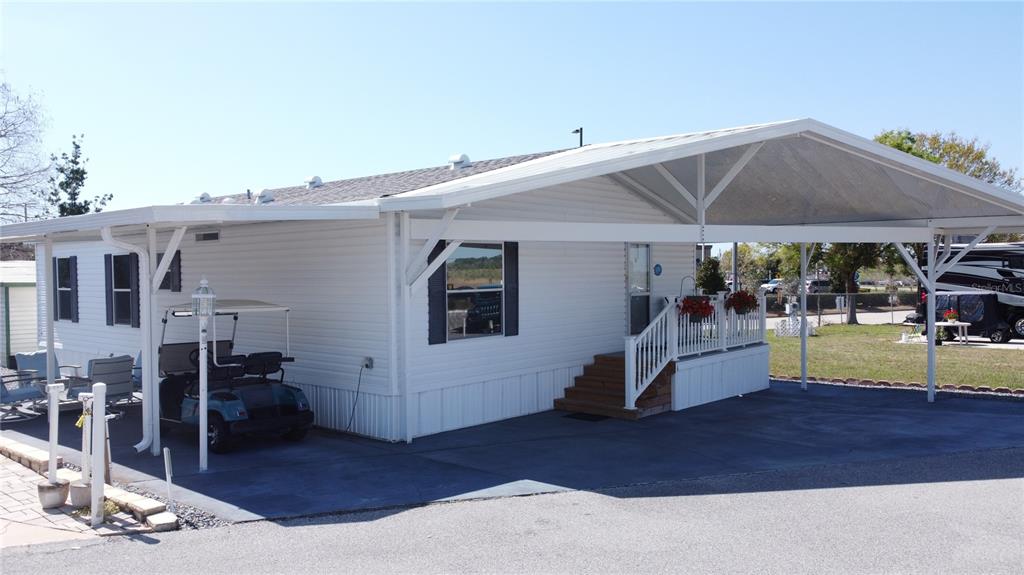 251 Patterson Road, Unit I3 Haines City, FL 33844 - Photo 2 of 38 a view of a outdoor space