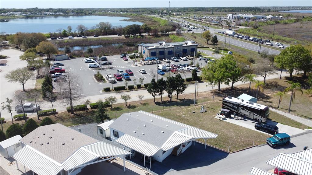 251 Patterson Road, Unit I3 Haines City, FL 33844 - Photo 37 of 38 an aerial view of a house with outdoor space