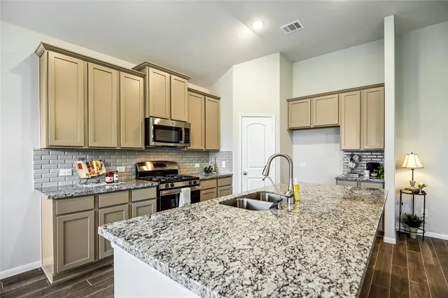 a view of a storage & utility room with closet