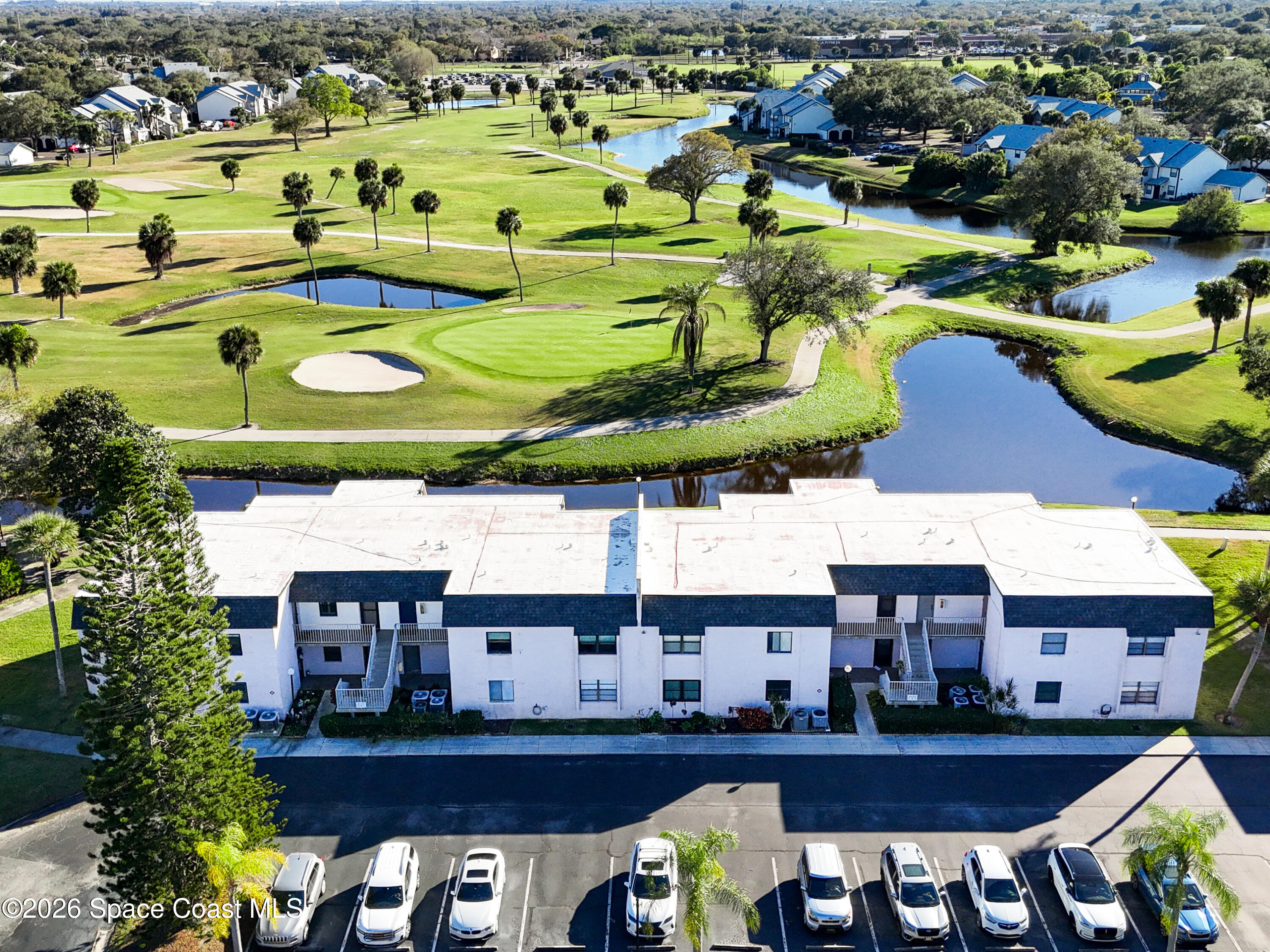 2727 North Wickham Road, Unit 2059 Melbourne, FL 32935 - Photo 23 of 32 Building 9 with a beautiful view