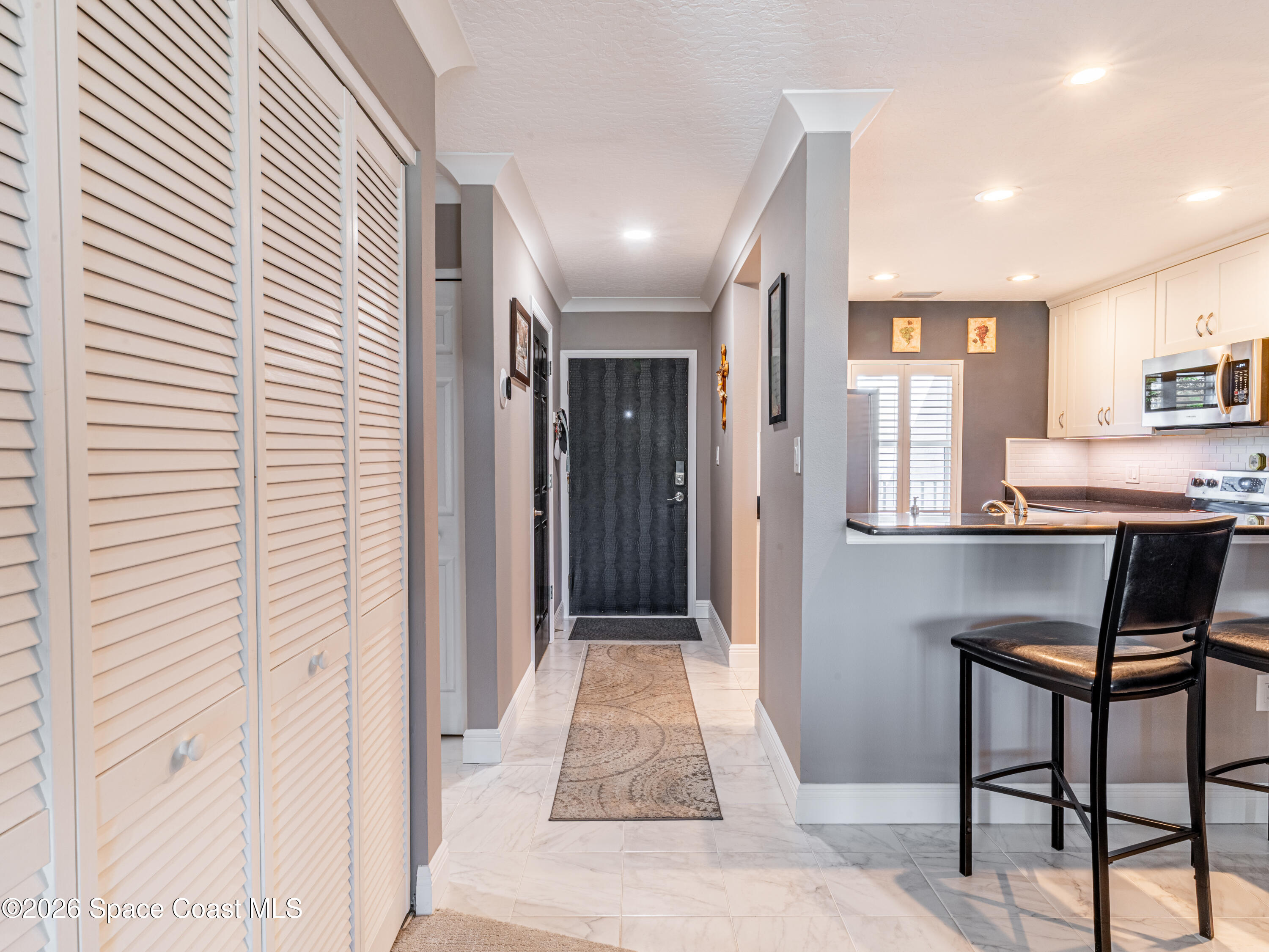 2727 North Wickham Road, Unit 2059 Melbourne, FL 32935 - Photo 8 of 32 Foyer