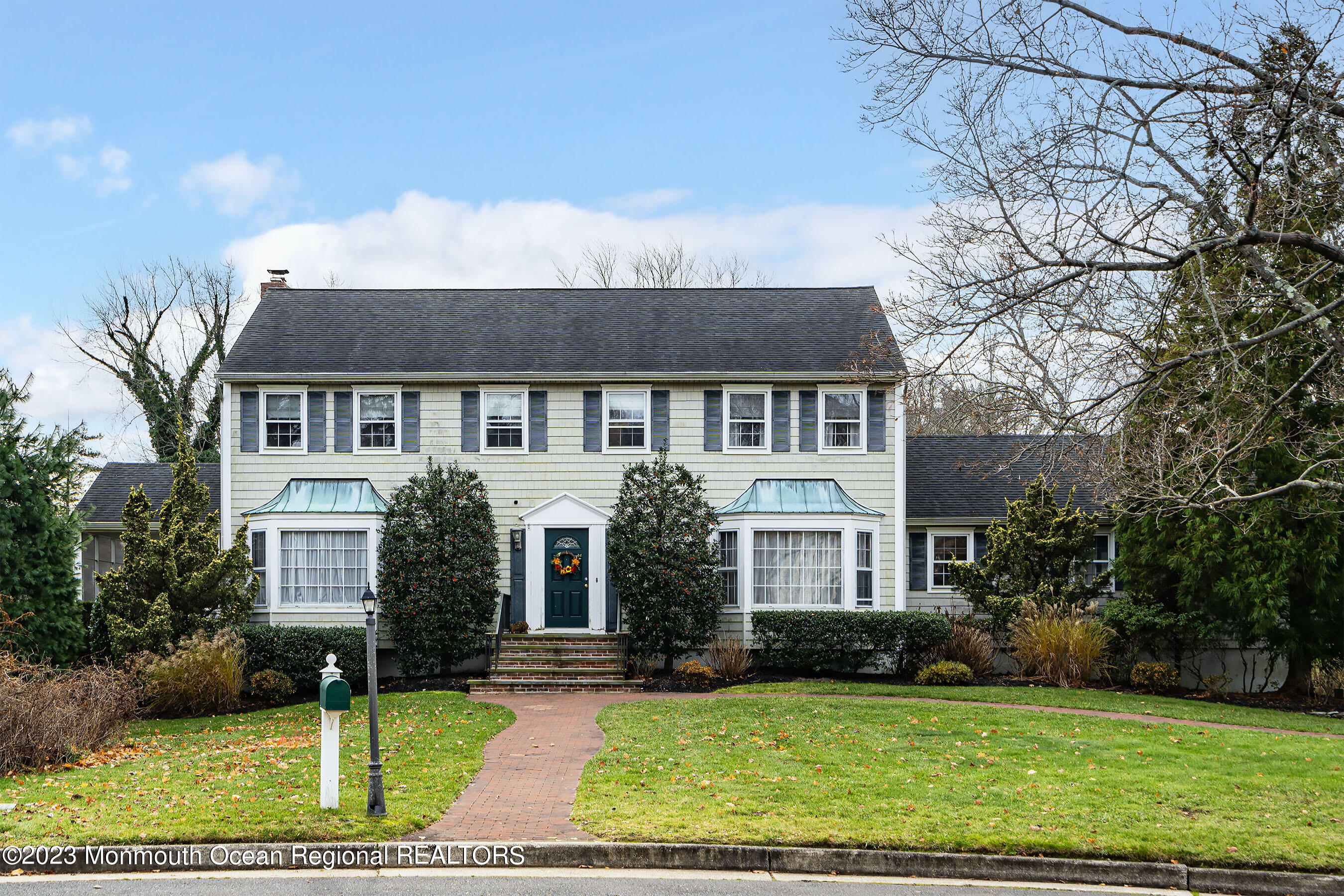 7 Pirates Cove Road Little Silver, NJ 07739 - Photo 1 of 41 a front view of a house with a yard