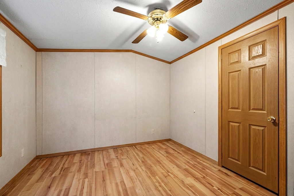 45 Kins Court Wareham, MA 02558 - Photo 13 of 16 a view of empty room with wooden floor