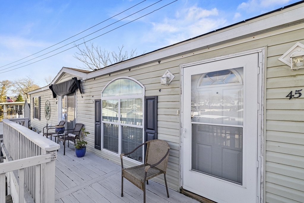 45 Kins Court Wareham, MA 02558 - Photo 4 of 16 a view of a porch with furniture