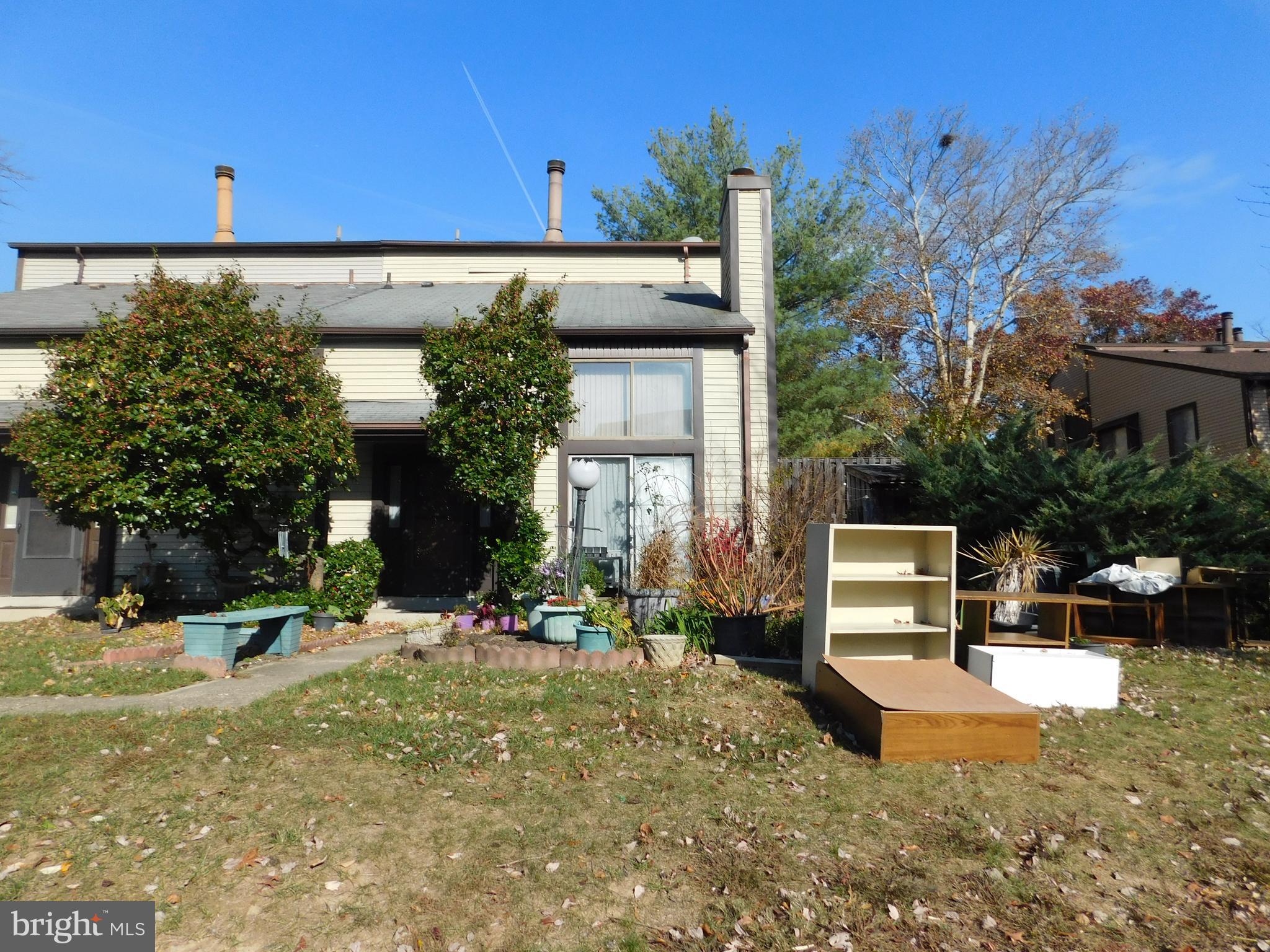a view of a pool with a patio